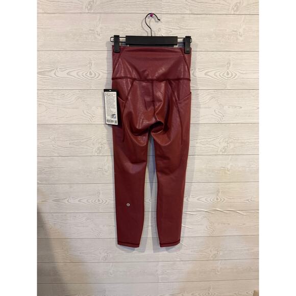 LululemoLULULEMON SZ 4 Wunder Train High-Rise Tight 25" *Foil Print Red Merlot - Picture 2 of 3